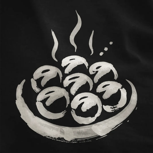 Bold takoyaki brushstroke illustration on black fabric, showcasing contrast art and foodie symbolism.
