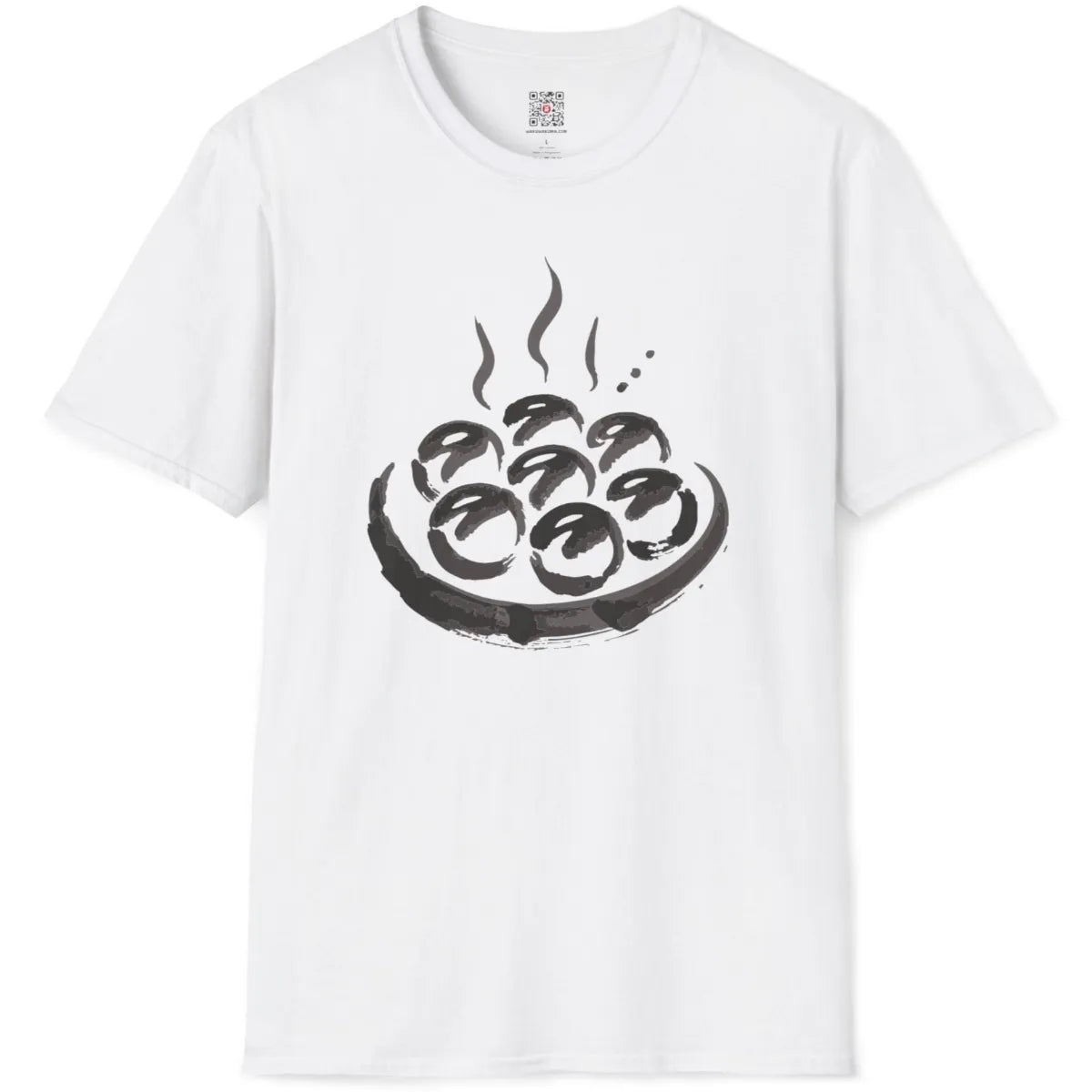 White t-shirt flatlay featuring takoyaki-inspired expressive artwork with calming colors and crafted design.