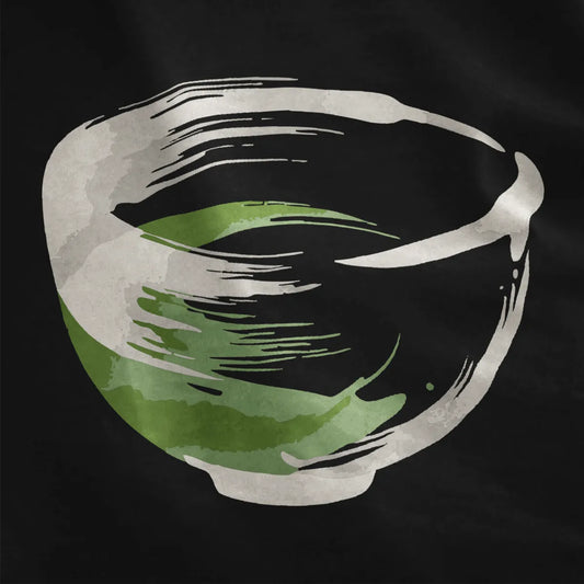 Expressive matcha bowl brushstroke design on black fabric, tranquil scene and cultural symbolism.