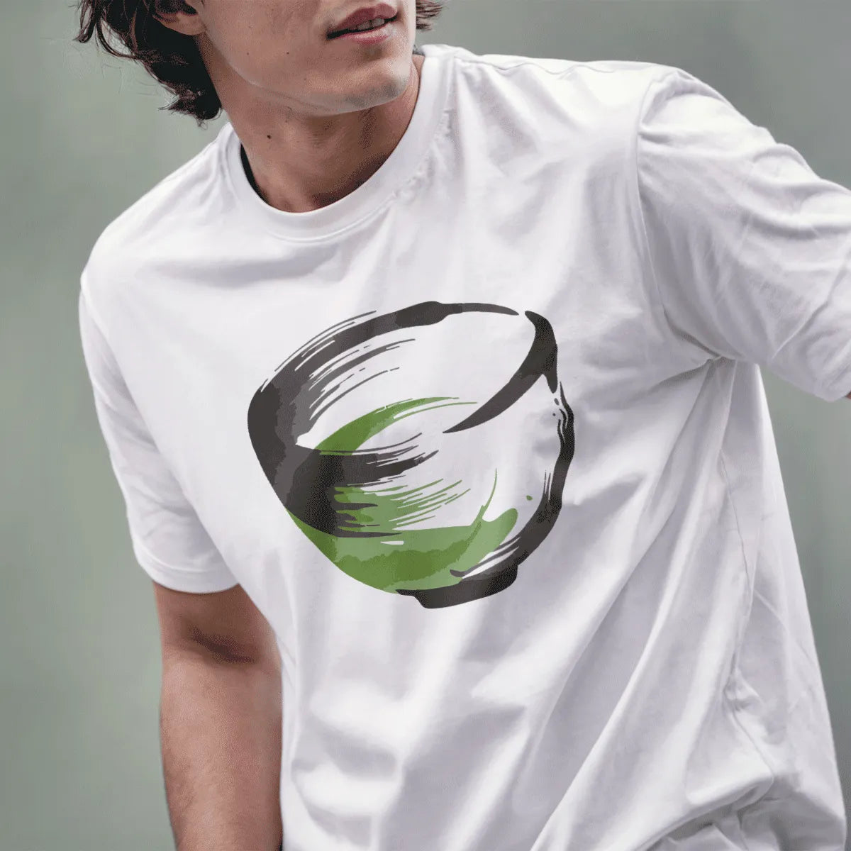 Male model wearing white t-shirt featuring vibrant green matcha bowl, simple and clean design.