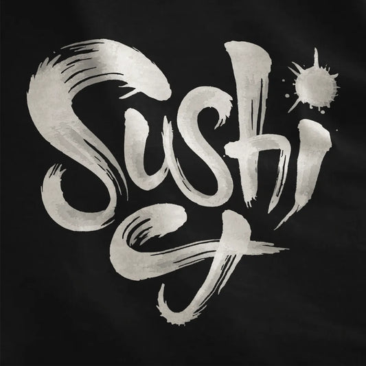 Black fabric close-up showing textured sushi brushstroke lettering, bold text font, expressive design.