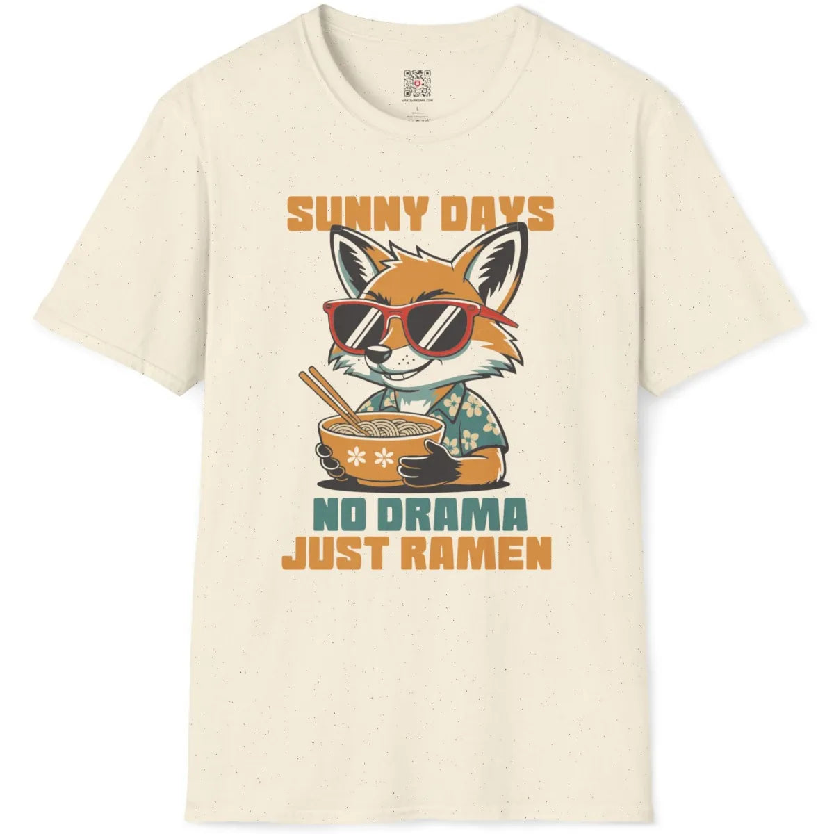 Natural fabric flatlay of t-shirt with happy fox wearing flower-patterned teal shirt, holding ramen bowl.