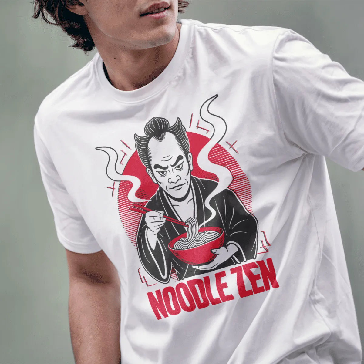 Male model wearing white samurai ramen t-shirt with zen art and bold text visible below the figure.