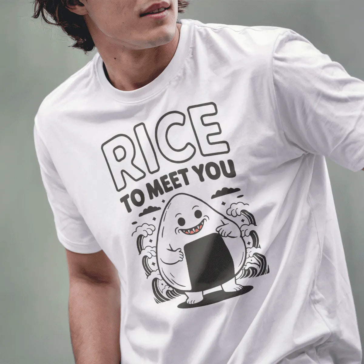 Male model in white shirt featuring smiling onigiri cartoon with nori belt and pun text above in rounded font.
