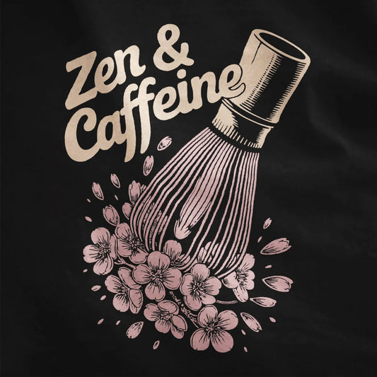 Black shirt close-up highlighting bright orange "Zen & Caffeine" text, matcha chasen, and sakura cherry blossoms.