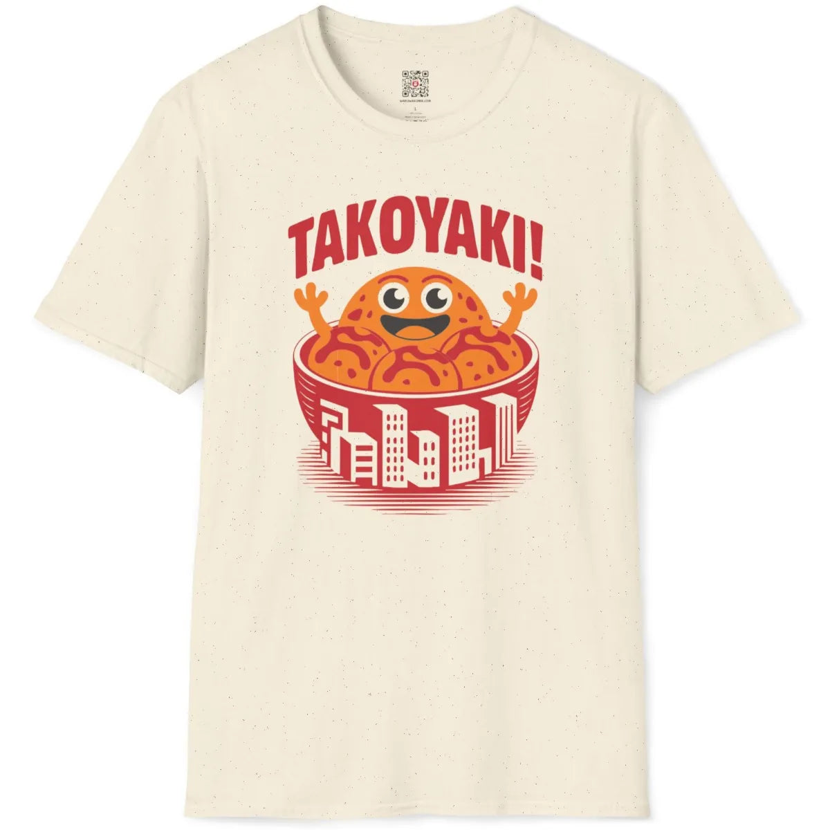 Natural fabric flatlay of playful takoyaki bowl shirt featuring urban cityscape design.