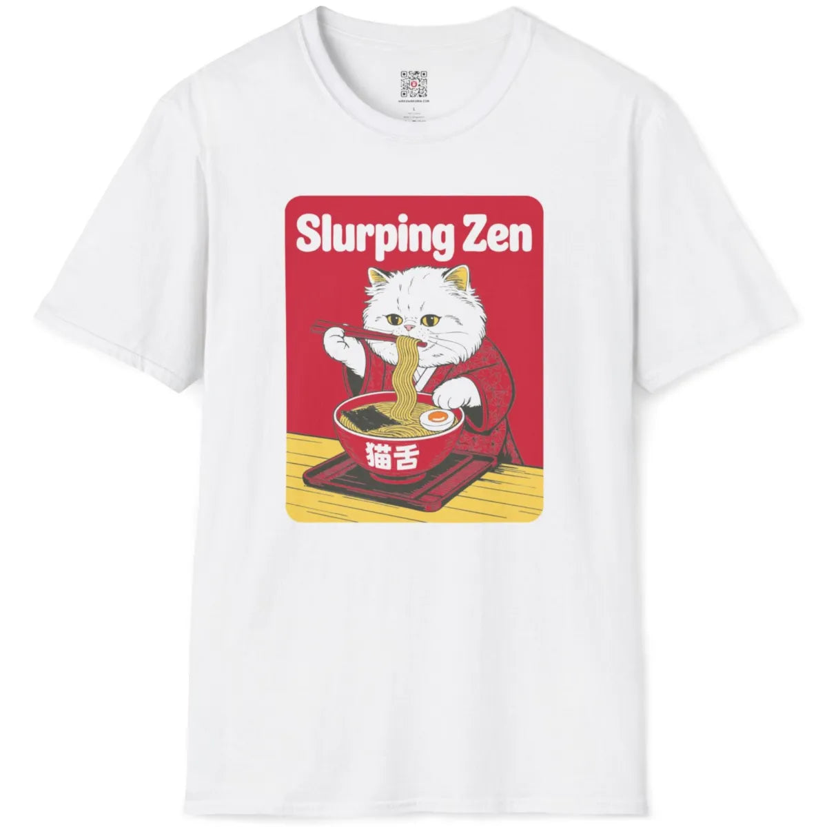 Flatlay of white t-shirt displaying whimsical cat ramen shirt with red kimono and chopsticks.