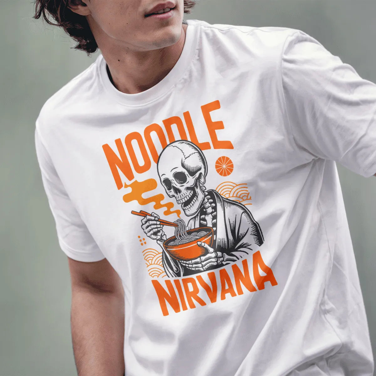 Male model wearing white t-shirt with skeleton in kimono eating ramen, orange text above and below.