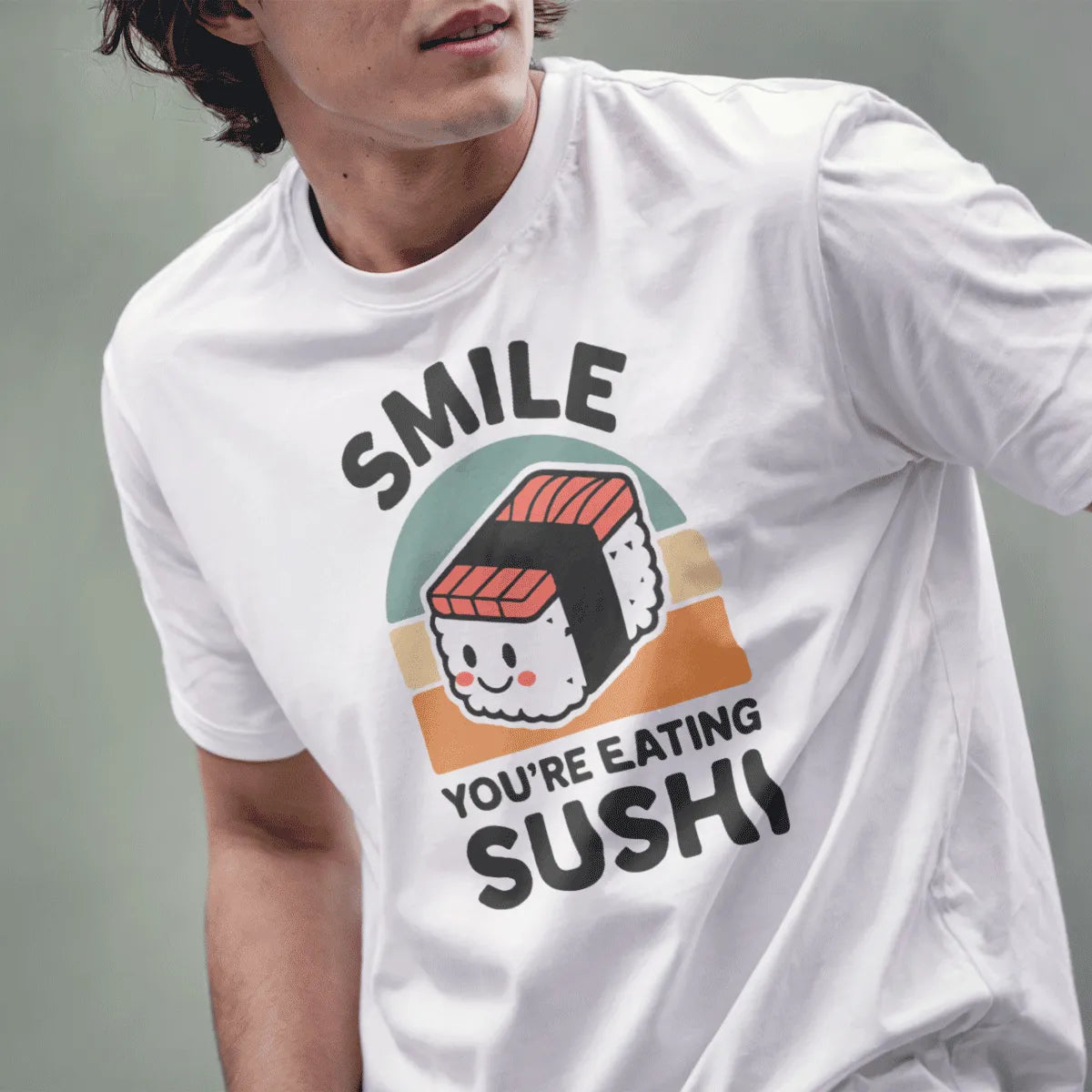 Male model in white t-shirt, cheerful nigiri sushi, "SMILE" text, sushi t-shirt, phrase motivation.