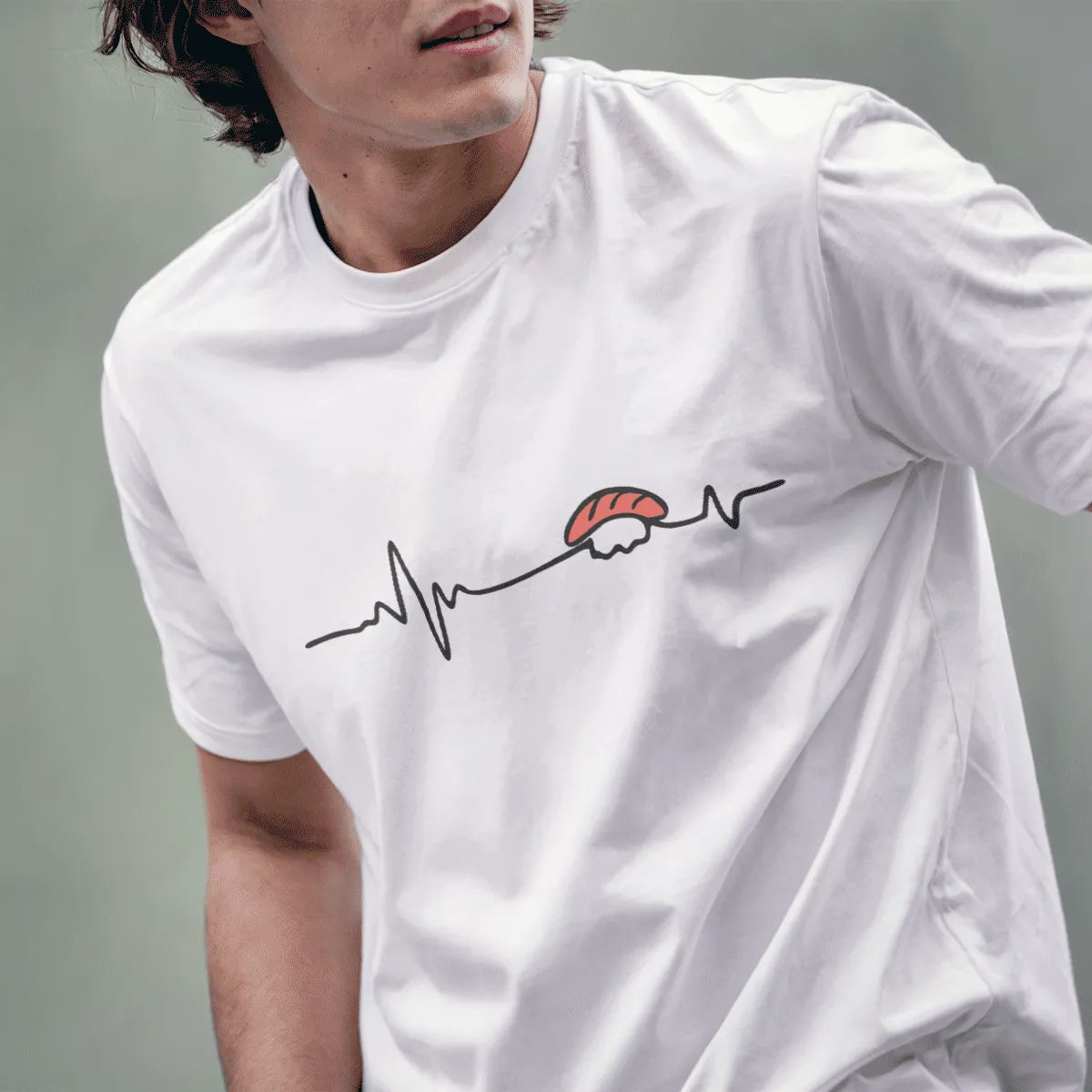 Male model in white sushi heartbeat t-shirt, minimalist t shirt, sushi art, cultural symbolism.