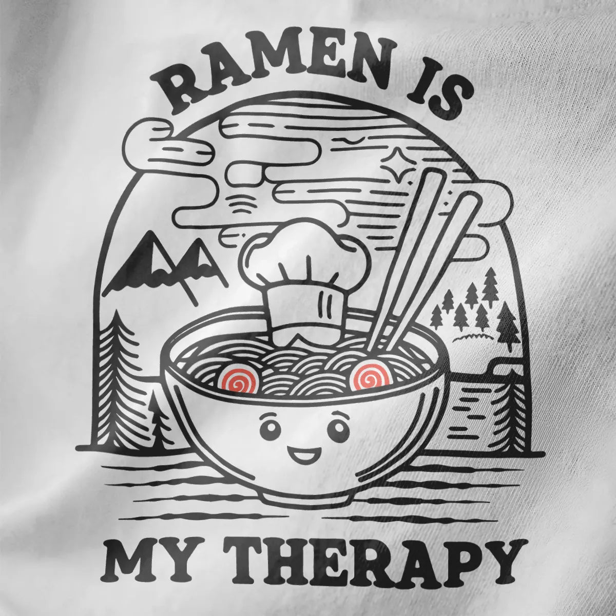 Close-up of playful ramen t-shirt design on white fabric, featuring cozy food and serene landscape details.