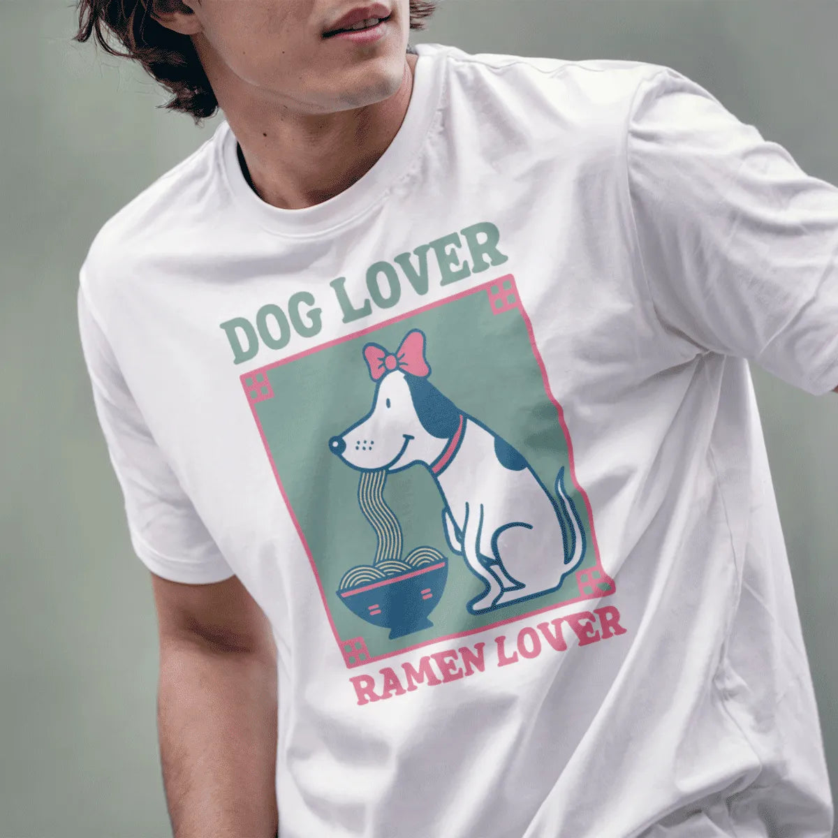 Male model in white t-shirt with dog and ramen, dog lover, ramen t-shirt, positive messaging.