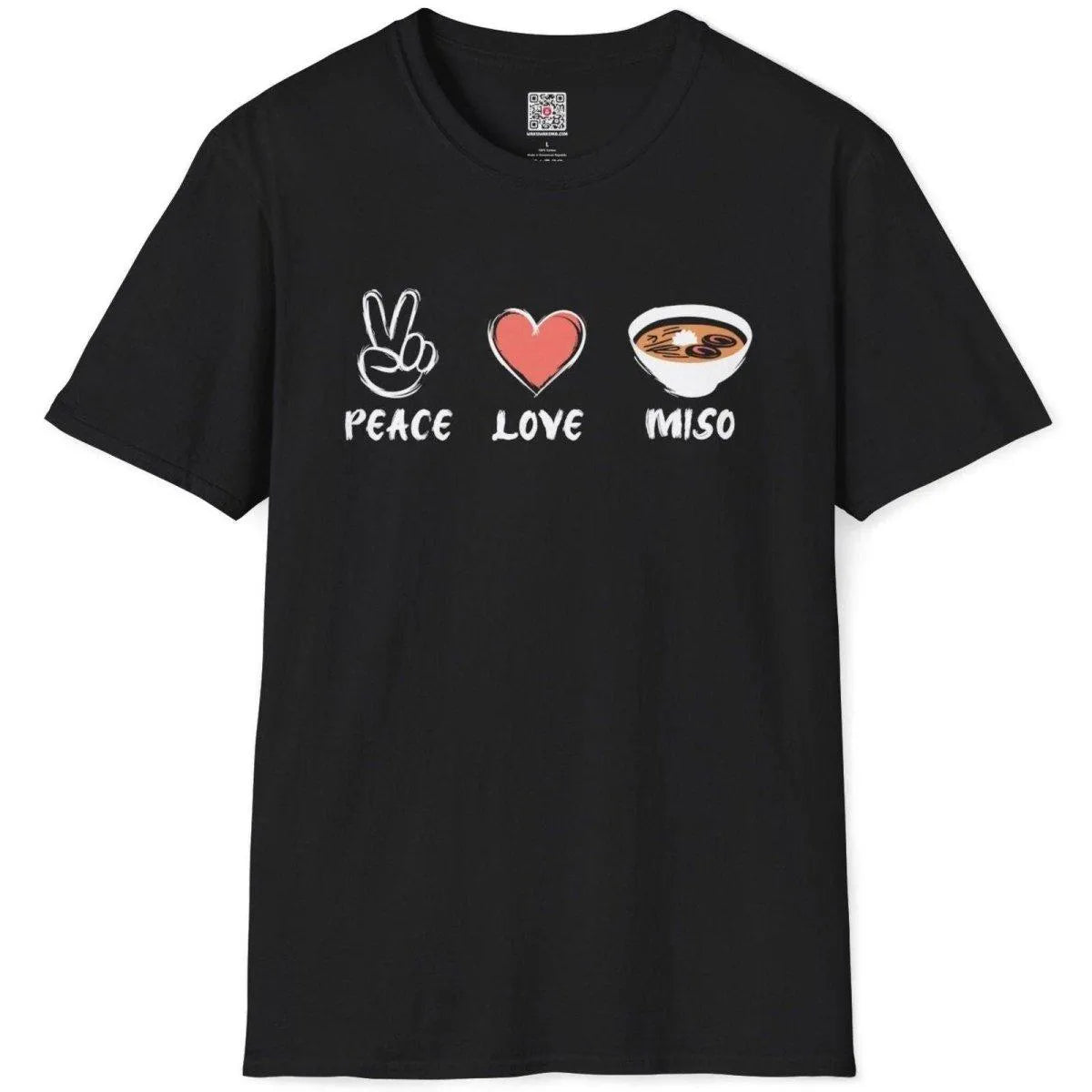 Black t-shirt flatlay with vibrant peace sign, heart, and detailed miso soup bowl artwork in cultural fusion style.
