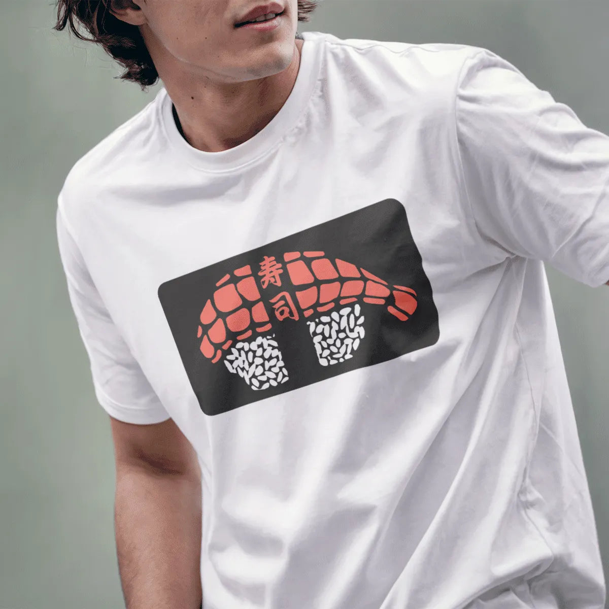 Male model in white t-shirt with coral pink sushi roll and kanji design. japanese t-shirts, contemporary styling