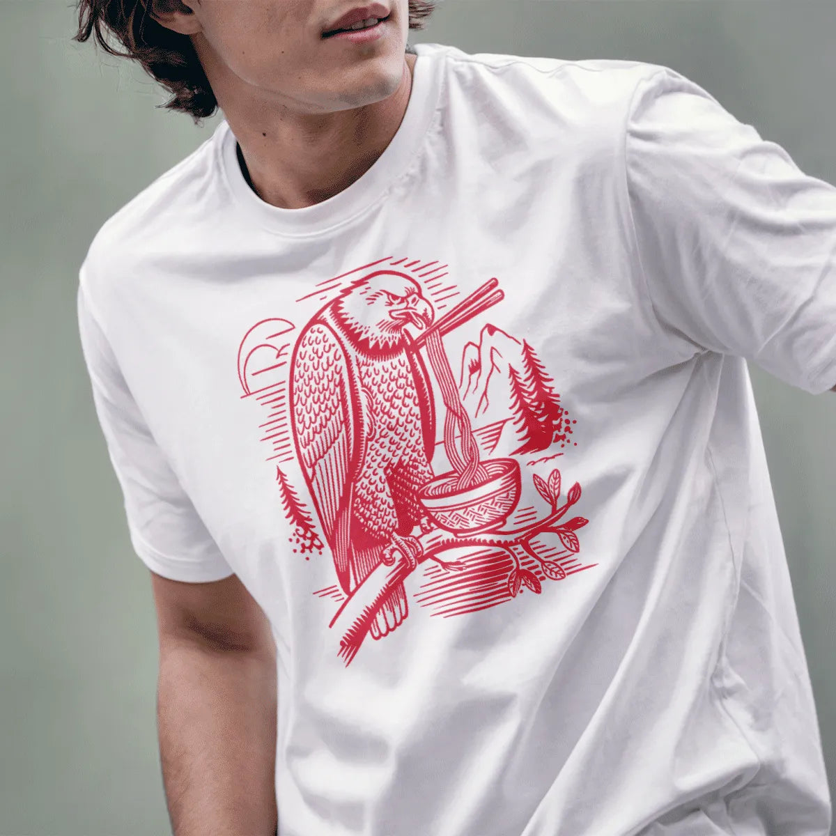 Male model in white t-shirt with eagle eating ramen, mountain landscape, ramen t-shirt.