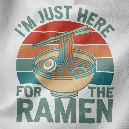 White fabric close-up of ramen bowl with egg and noodles, “I’m Just Here For The Ramen” text, ramen t-shirt, instant noodle.