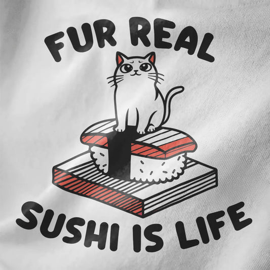 White fabric close-up of playful cat sitting on salmon nigiri sushi with “FUR REAL SUSHI IS LIFE” in bold typography.
