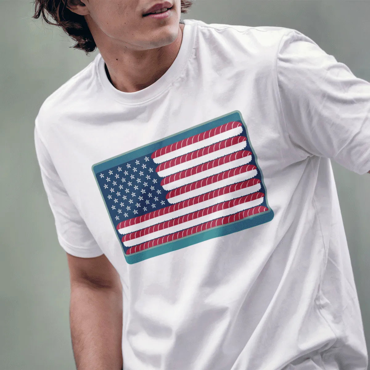 Male model in white shirt featuring American flag made of sushi and flowers, cultural symbolism, sushi t-shirt.