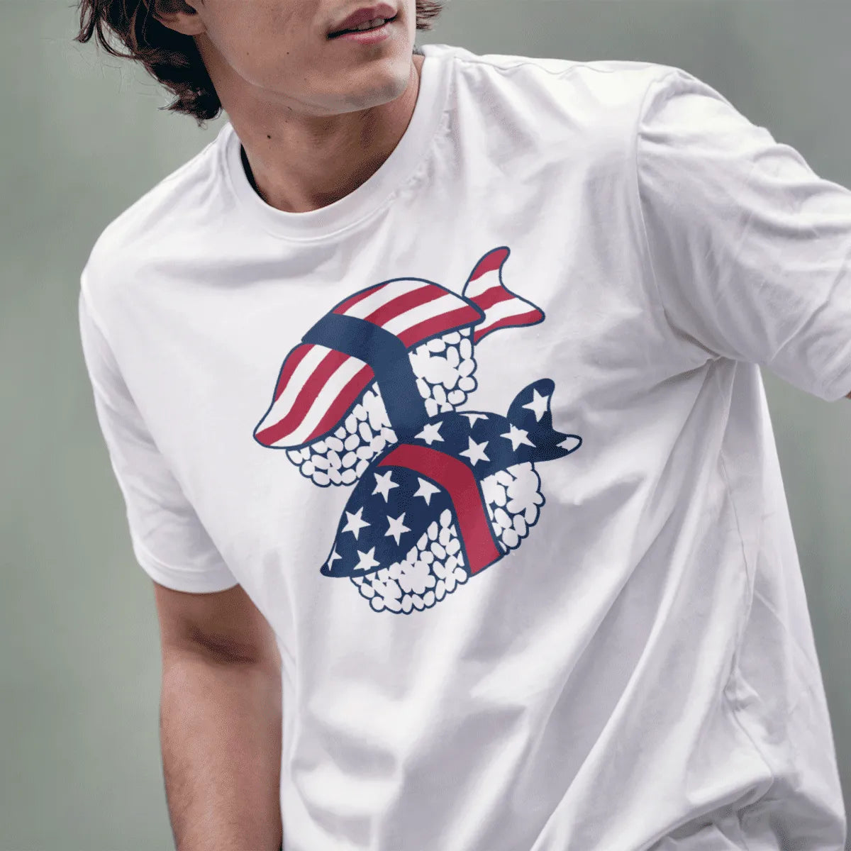 Male model in white shirt with sushi rolls styled as American flags, japanese t-shirts, modern fusion.