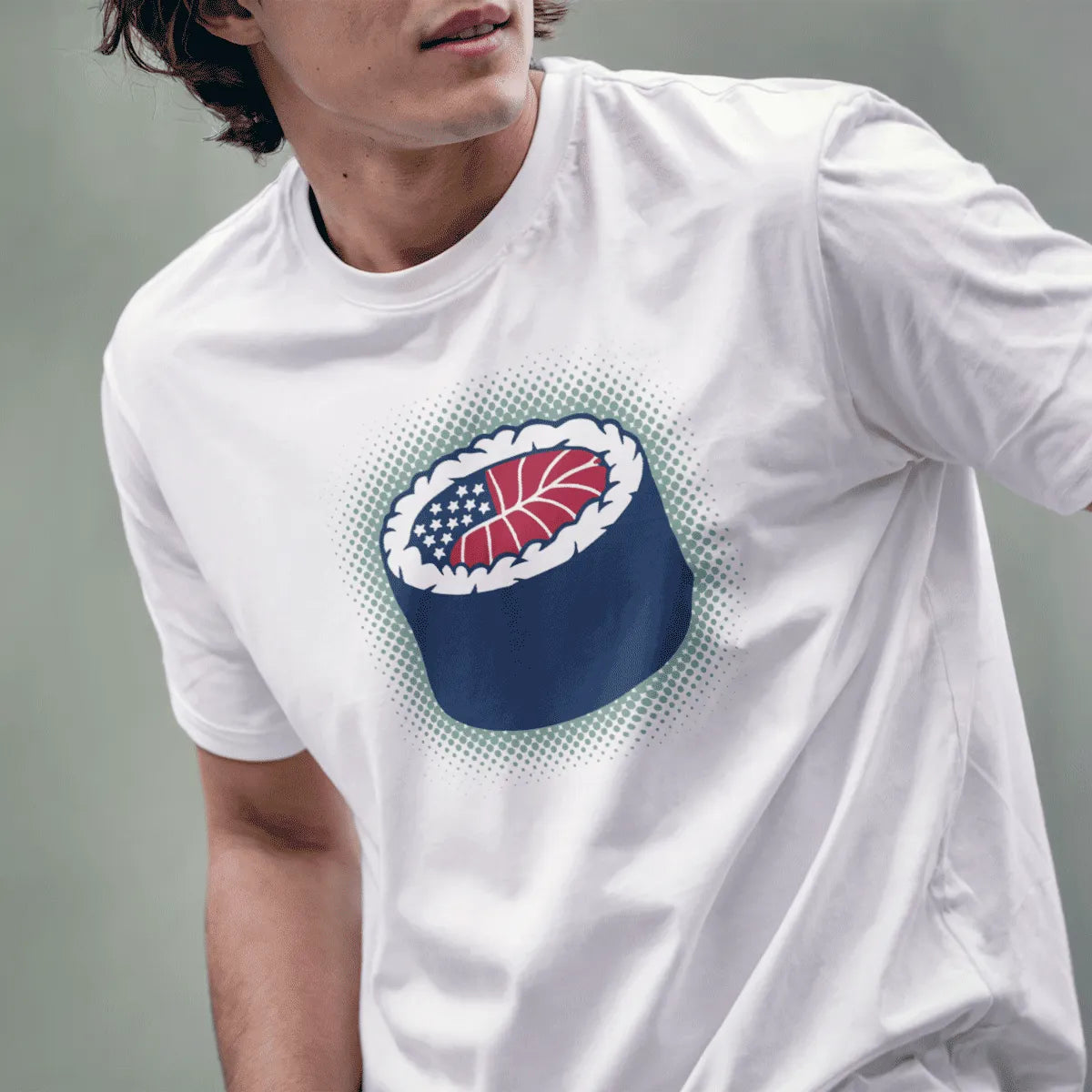 Male model in white t-shirt featuring sushi roll with American flag; sushi t-shirt, fusion cuisine, cultural symbols.