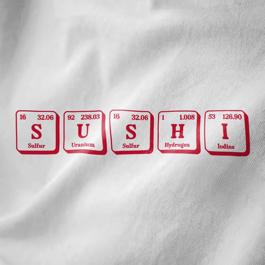 Close-up of white fabric showing "SUSHI" in periodic table style with red elements on a minimalist sushi t-shirt.