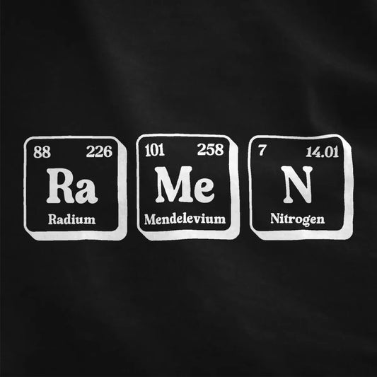 Close-up of red and white periodic table ramen shirt on black fabric, highlighting contrast art and bold text fonts.