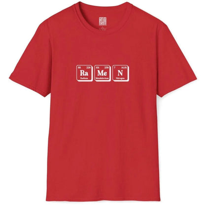 Flatlay of red ramen t-shirt with periodic table elements, highlighting ramen pun and cheerful fusion cuisine theme.