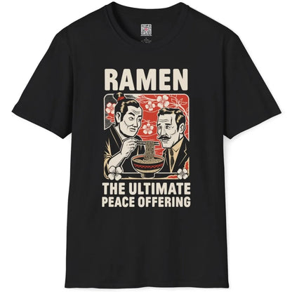 Black t-shirt flatlay with ramen peace design, wave patterns, and bold fonts.