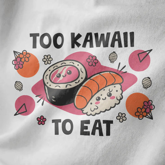 Close-up of kawaii sushi faces on white fabric, with too kawaii to eat text and cherry blossom accents.