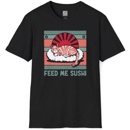 Black flatlay tee with sushi cat design, rising sun, ornate waves, and distressed “FEED ME SUSHI” slogan, vintage aesthetic.