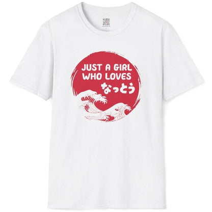 White t shirt flatlay with playful natto text and blue wave circle, japanese t shirts, simple t shirt design.