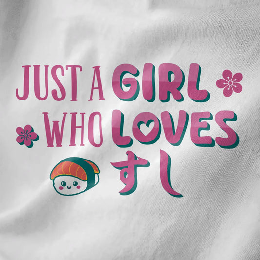 White closeup of sushi t-shirt with playful pink and teal text, smiling sushi character, sushi shirt, japanese t-shirts.