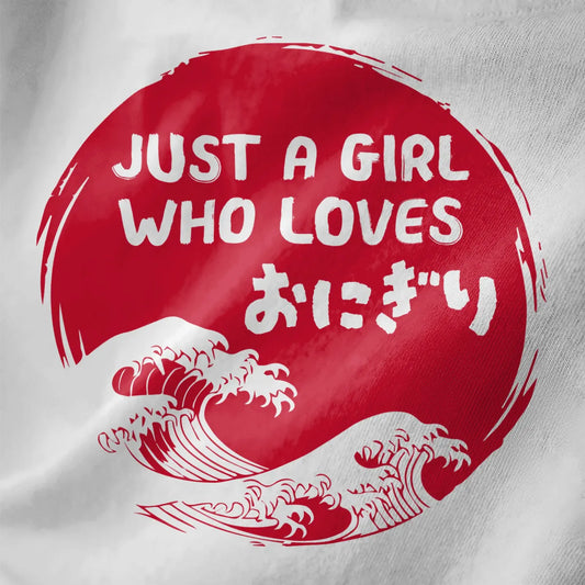 White fabric close-up of onigiri t-shirt with red sun, kanji, and minimalist waves. Japanese t shirts, foodie style.