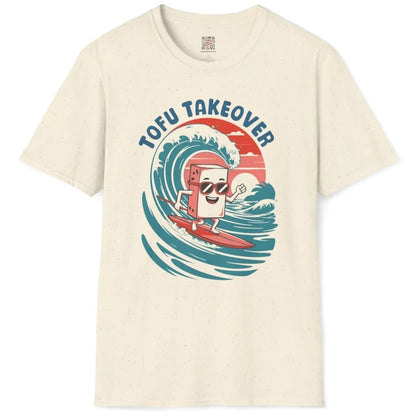Natural shirt flatlay with cartoon tofu surfing, soft palette, and humorous quote above the wave.