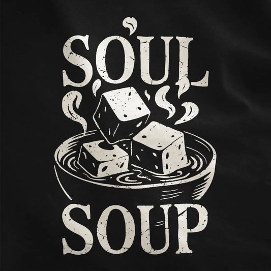 Monochrome miso soup bowl with tofu, "SOUL SOUP" text on black fabric, japanese t-shirts, organic aesthetic.