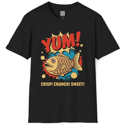Black t-shirt flatlay, playful taiyaki fish, "YUM!" and "CRISP! CRUNCH! SWEET!" text, junk food shirt.