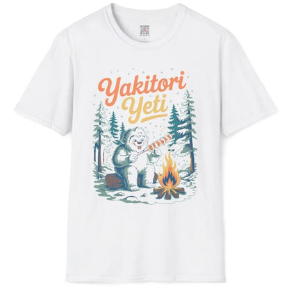 Yakitori Yeti on white t-shirt flatlay, whimsical monster, snowy forest, camping shirt.
