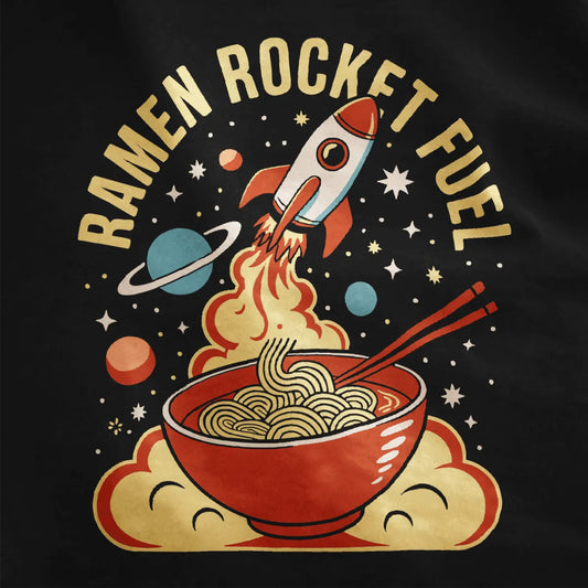 Bold ramen and rocket illustration with retro "RAMEN ROCKET FUEL" text on black fabric, cosmic design.