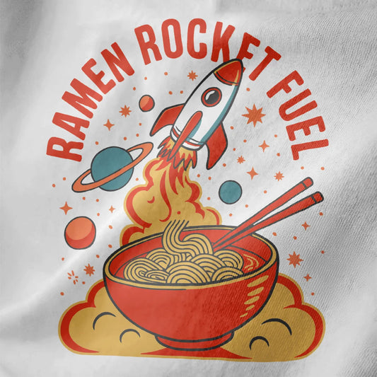 Vibrant ramen bowl and rocket launch design on white fabric, featuring retro text and cosmic elements.