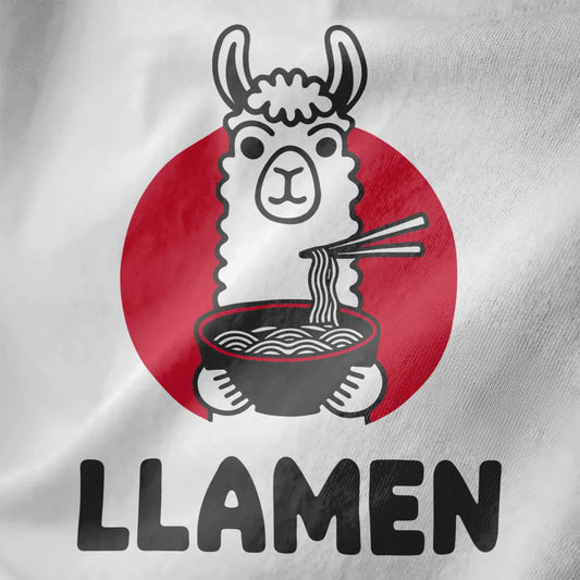 Closeup of a white t-shirt featuring a cartoon llama eating ramen, bold LLAMEN text, whimsical illustration.