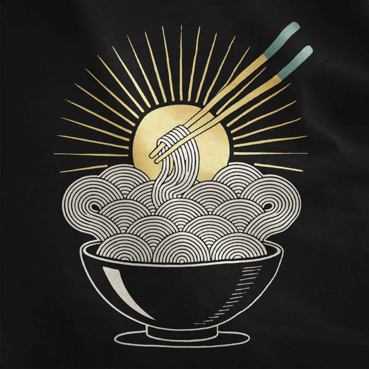 Noodle sunburst t-shirt closeup on black, bold ramen bowl, yellow sunburst, and junk food shirt vibe.