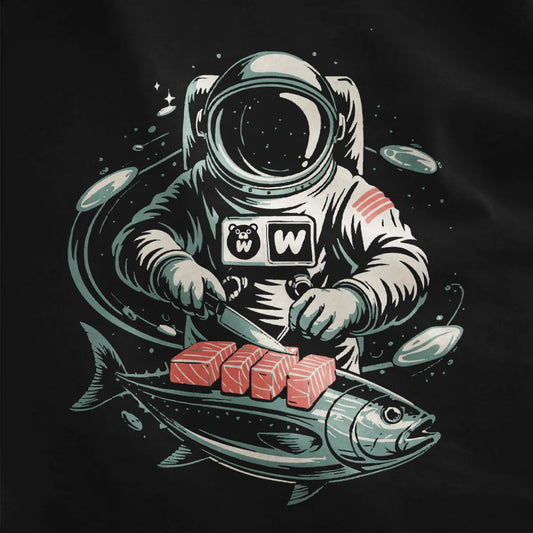 Close-up of black fabric with detailed sushi t-shirt design showing astronaut cutting tuna in space.