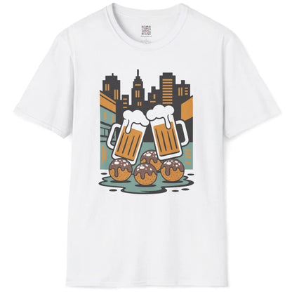 White t-shirt flatlay featuring stylized cityscape with celebratory beer toast and takoyaki balls.