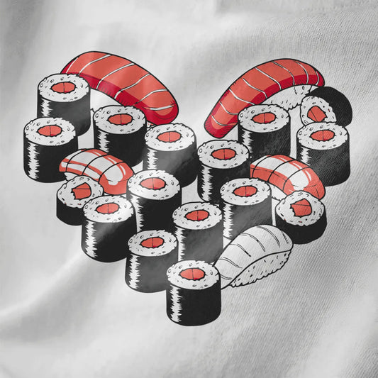 Close-up of sushi heart art on white fabric, featuring vibrant colors and sushi t-shirt design.