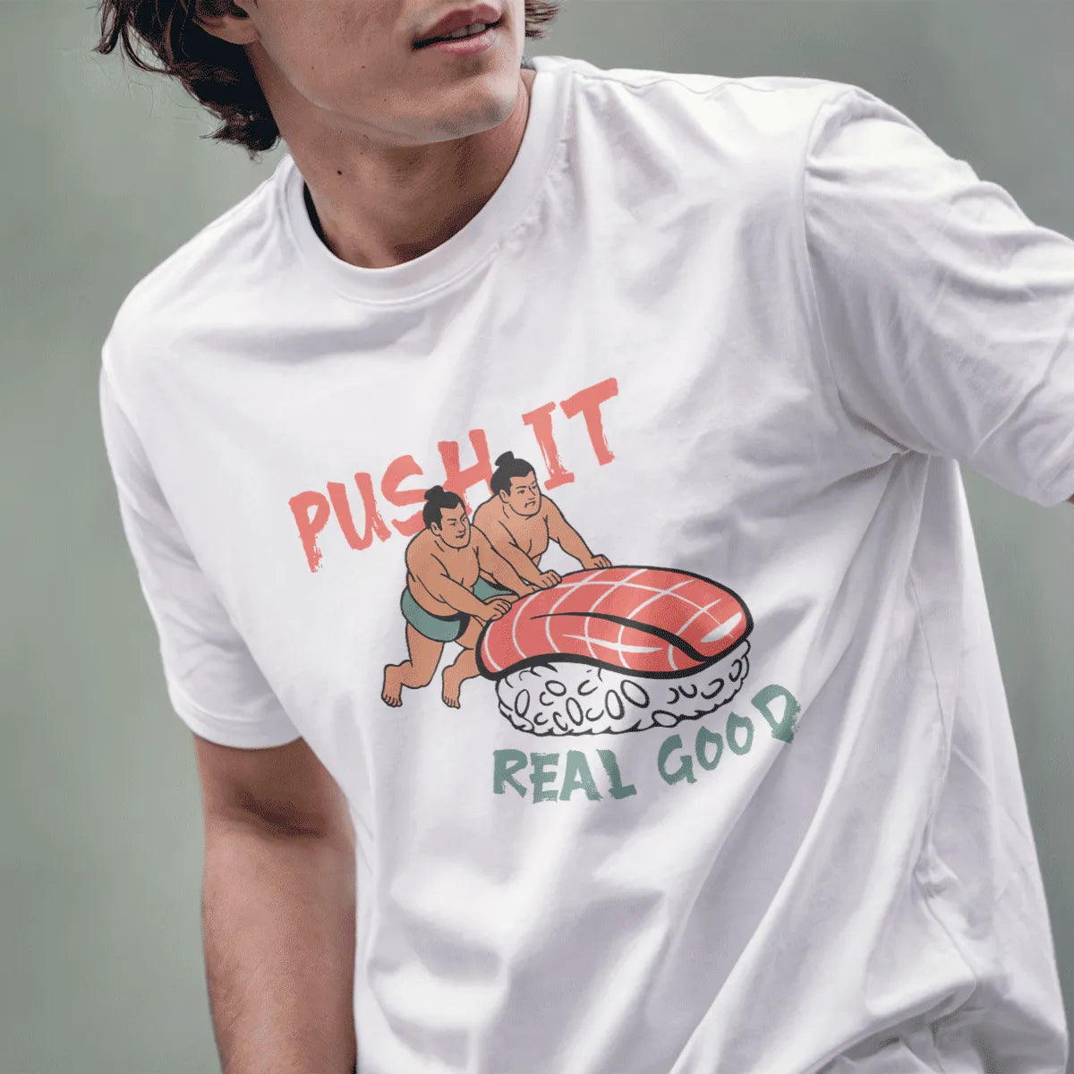 Male model in white t-shirt with sumo wrestlers and nigiri, motivational quote, sushi t-shirt.