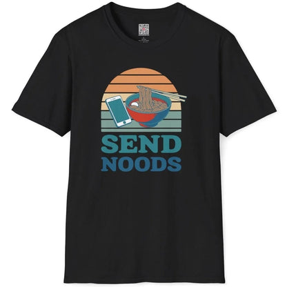 Black t-shirt flatlay with ramen bowl, smartphone, retro sunset, “SEND NOODS” in teal. ramen t-shirt, bold text fonts.