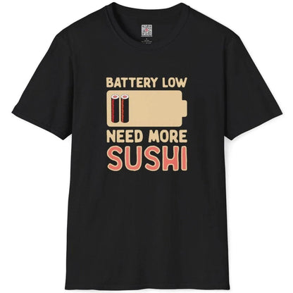 Black shirt flatlay with “BATTERY LOW,” battery icon with sushi, “NEED MORE SUSHI” text. sushi shirt, bold text fonts.