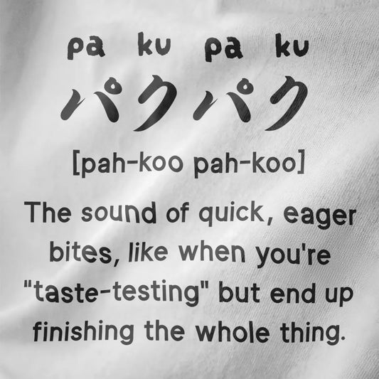 Bold black Japanese "paku-paku" text with English captions on white fabric, funny shirts with sayings, junk food clothing.