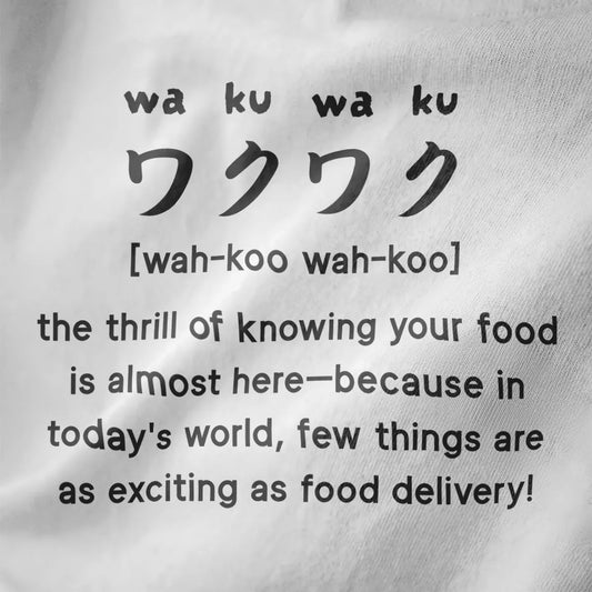 White fabric close-up showing bold “waku-waku” Japanese text in rhythmic pattern, foodie style, kawaii clothes.