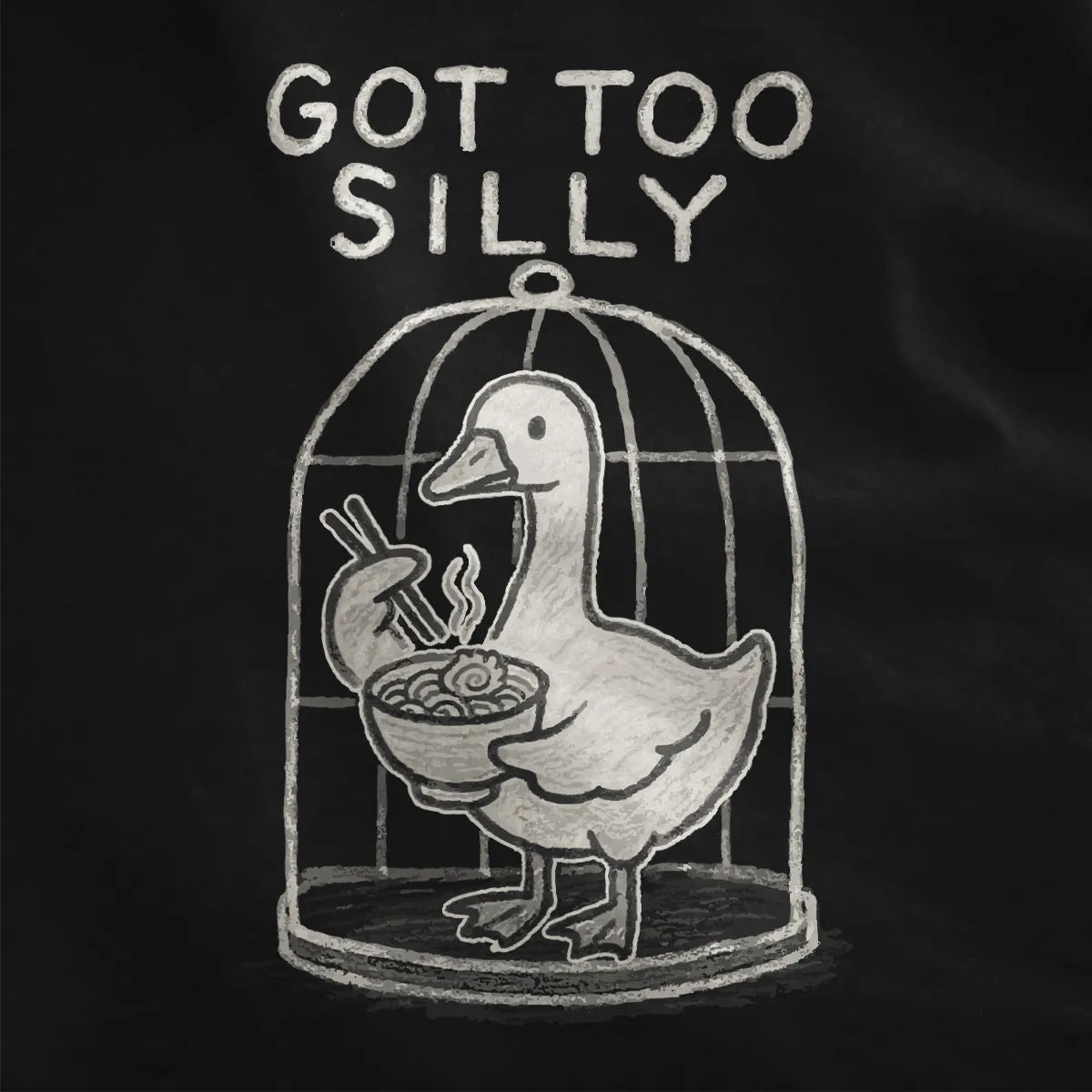 Sketch-style duck inside rounded birdcage with ramen and playful quote, black shirt up-close detail.